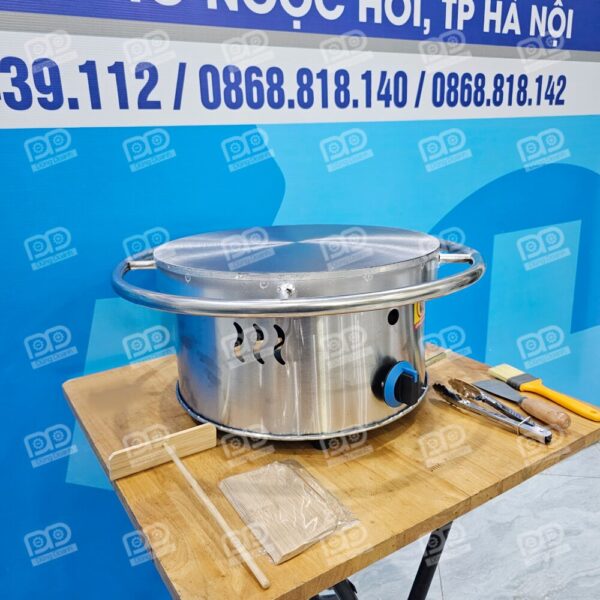 Máy có núm đánh lửa Magento như bếp gas gia đình